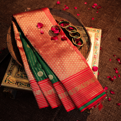 Luxurious red Katan Silk Saree with golden border

